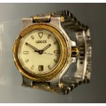 Gucci - a ladies stainless steel and gold coloured two tone bracelet wrist watch, quartz movement,
