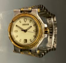 Gucci - a ladies stainless steel and gold coloured two tone bracelet wrist watch, quartz movement,