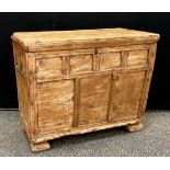 A 19th century Continental distressed pine box, probably French, hinged lid, multi panelled slightly