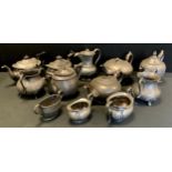 A 19th century pewter three piece tea set, other teapot, Arts & Crafts water jug, cream jug
