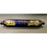 A 19th century Bristol Blue glass rolling pin, decorated with nautical scene, in script 'For my