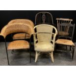 A pair of metal wicker patio or garden chairs, arched backs, another Lloyd Loom style;