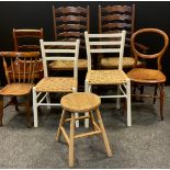 A pair of rush seated ladder back carver chairs, 19th century oak child’s chair, etc.(8)