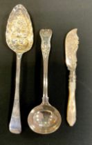 A George IV silver serving spoon, embossed bowl, floral haft, William Seaman, London 1822; William