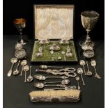 A set of nine silver coloured metal tea spoons, elephant and sterling marks; others unmarked;