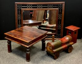 A wrought iron and mahogany framed rectangular wall mirror, ring and bar linked collar, moulded