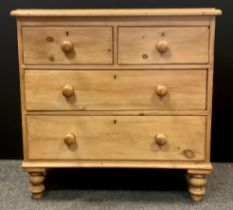 A early Victorian pine chest of drawers; over-sailing top, pair of drawers to frieze over two