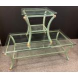 A contemporary tubular green and gilt metal glass topped coffee table, green speckled curved