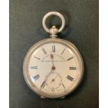 A late 19th century silver open faced pocket watch, The Greenwich Lever, retailed by W E Watts,
