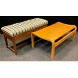 An Edwardian inlaid mahogany duet piano stool, upholstered hinged lid, tapering block legs, two rail