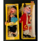 Toys and Juvenilia - two Pelham Puppets, wizard and witch, both boxed (2)