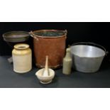 A hammered copper log bucket; aluminium pan, funnel with oak plinth, stoneware jar etc