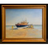 P Hopkinson, 20th century, Cornish school, St Ives Life Boat launching from the Beach, signed, oil