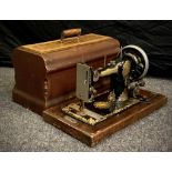 A Jones’ Family C. S vintage mechanical sewing machine, number 325056.