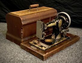 A Jones’ Family C. S vintage mechanical sewing machine, number 325056.