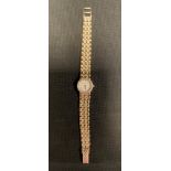 A 9ct gold Bueche Girod ladies wristwatch, 9ct gold articulated strap