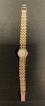 A 9ct gold Bueche Girod ladies wristwatch, 9ct gold articulated strap