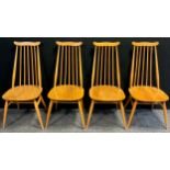 A set of four Lucien Ercolani, for Ercol, ‘Goldsmith’ chairs, model 369, beech wood spindle-backs,
