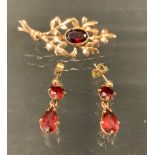 A red Garnet 9ct gold mounted floral brooch and earrings suite, 8.6g gross