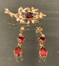 A red Garnet 9ct gold mounted floral brooch and earrings suite, 8.6g gross