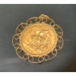 An Edward VII half sovereign pendant, 9ct gold mount, 1910, 6.2g gross
