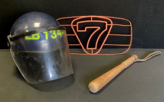 A Vintage Police Issue Riot Helmet, PAS 017, ARGUS 017T, 1CE 0086, blue, yellow issue numbers LBC