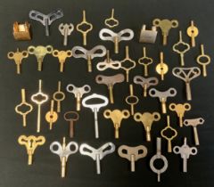 A collection of Victorian and later clock and watch keys, forty keys including long reach, doubles