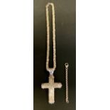 A large silver cross pendant necklace, set with three rows of paste stones, ornate chain return,