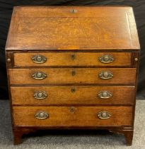 A George III oak bureau, fall door to top enclosing an interior fitted with central small cupboard