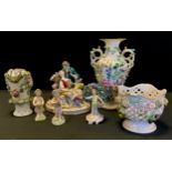 A Continental figure group of man, lady and dog, 18cm long, Derby style putti, 18cm high; etc (6)