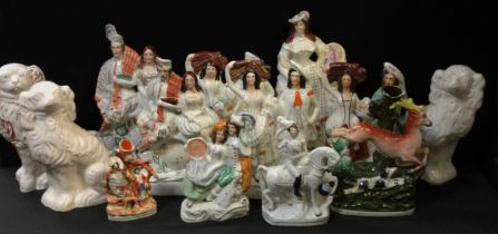 A quantity of Staffordshire flatbacks including; courting couples, market lady, scots man and his