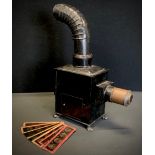 A Gloria E.P Duplex burner magic lantern, conforming slides depicting Victorian cartoons, scenery;