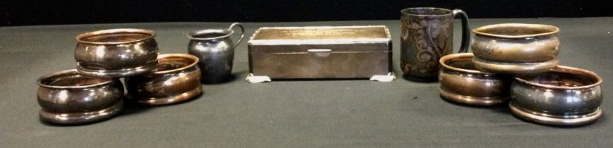 A silver mounted cigarette box, Birmingham,c.1962; a set of six Harrods of London silver plated