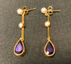 A pair of seed pearl and amethyst drop earrings, bar drop links set with two cream seed pearls above