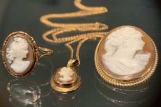A Cameo brooch, pendant and ring suite, all carved as maidens portraits, each with 9ct gold mount,