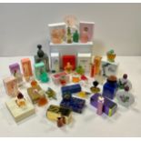 A selection of unusual perfume samples bottles, ranging from vintage to current day fragrances.