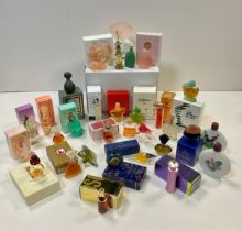 A selection of unusual perfume samples bottles, ranging from vintage to current day fragrances.