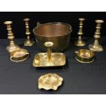 Brass - A pair of coin inset trench art ashtrays, pair of candlesticks, jam pan; etc