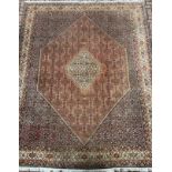 A Persian Bidjar rug / carpet, hand-knotted silk and wool mix, with central hexagonal medallion,