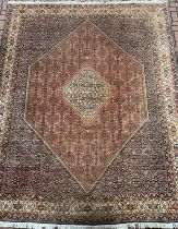 A Persian Bidjar rug / carpet, hand-knotted silk and wool mix, with central hexagonal medallion,