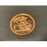 A 1980 proof half sovereign, 4g, cased with booklet