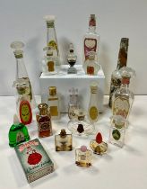 A selection of vintage American perfume bottles in various sizes and designs . Including The