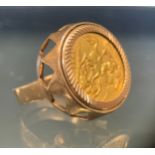A half sovereign ring, 1911, later unmarked yellow metal mount, size Q, 11.7g gross