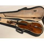A full size, 4/4, violin, cased with bow en-suite, the violin having a well figured two-piece
