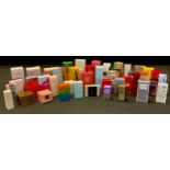 A large selection of perfume samples in their original boxes; samples include Claris, Hugo Boss