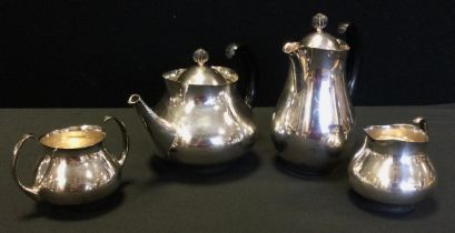 A Mappin and Webb four piece silver plate tea set designed by Eric Clements