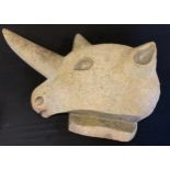 A large carved stone animal bust, Rhinoceros Head, 46cm high, 78cm wide