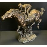 A Fairestware Academy bronzed resin sculpture of a Racehorse and Jockey Galloping, impressed