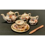 A group of six Coalport Miniature tea sets including Red Willow pattern bachelor tea set, comprising