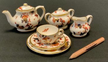 A group of six Coalport Miniature tea sets including Red Willow pattern bachelor tea set, comprising